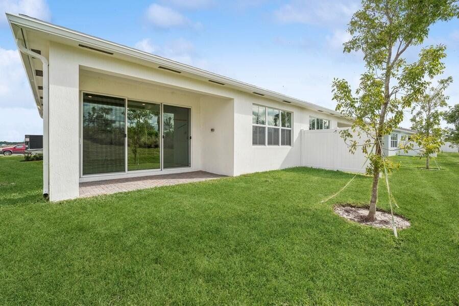 Front exterior of a new home in , Port St. Lucie, FL, highlighting curb appeal (Image 18).