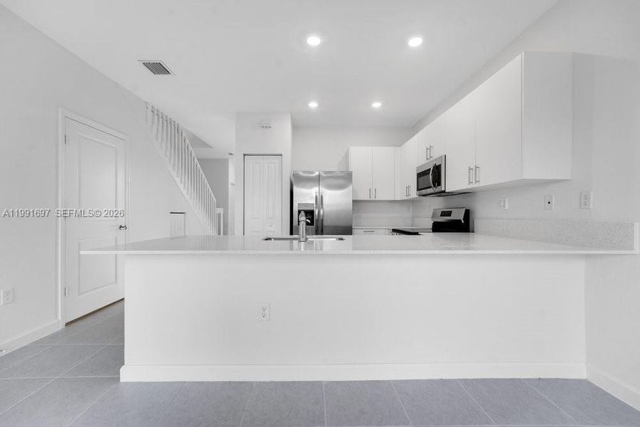 Furnished interior view inside a new home in , Homestead (Image 5). Furnished interior view inside a new home in , Homestead (Image 5).