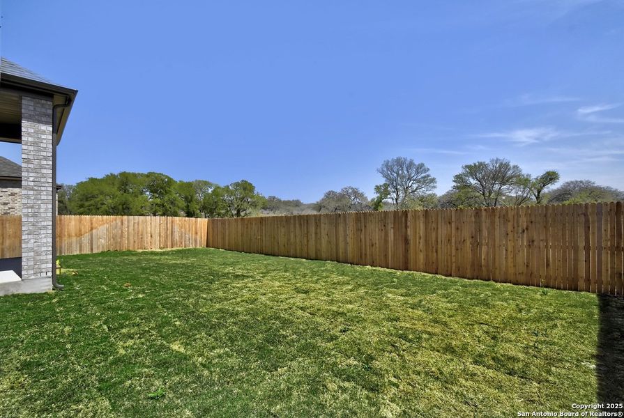 Front exterior of a new home in Alsatian Oaks: 60ft. lots, Castroville, TX, highlighting curb appeal (Image 21).