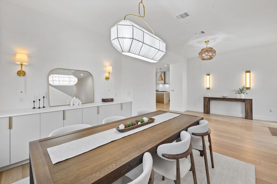 Dining space with light wood-style floors