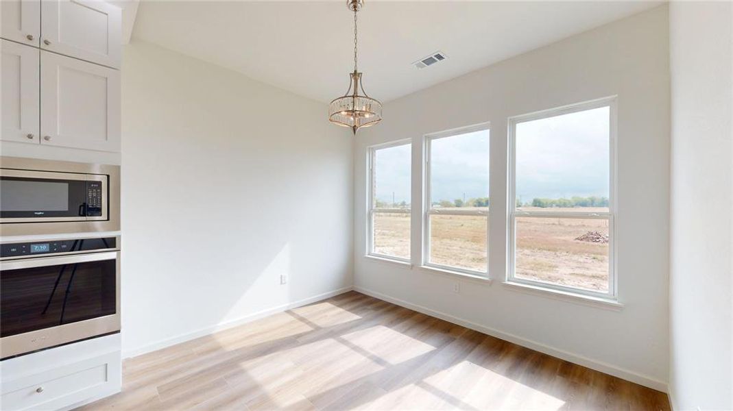 Spacious, unfurnished interior of a new home in , Point (Image 25).