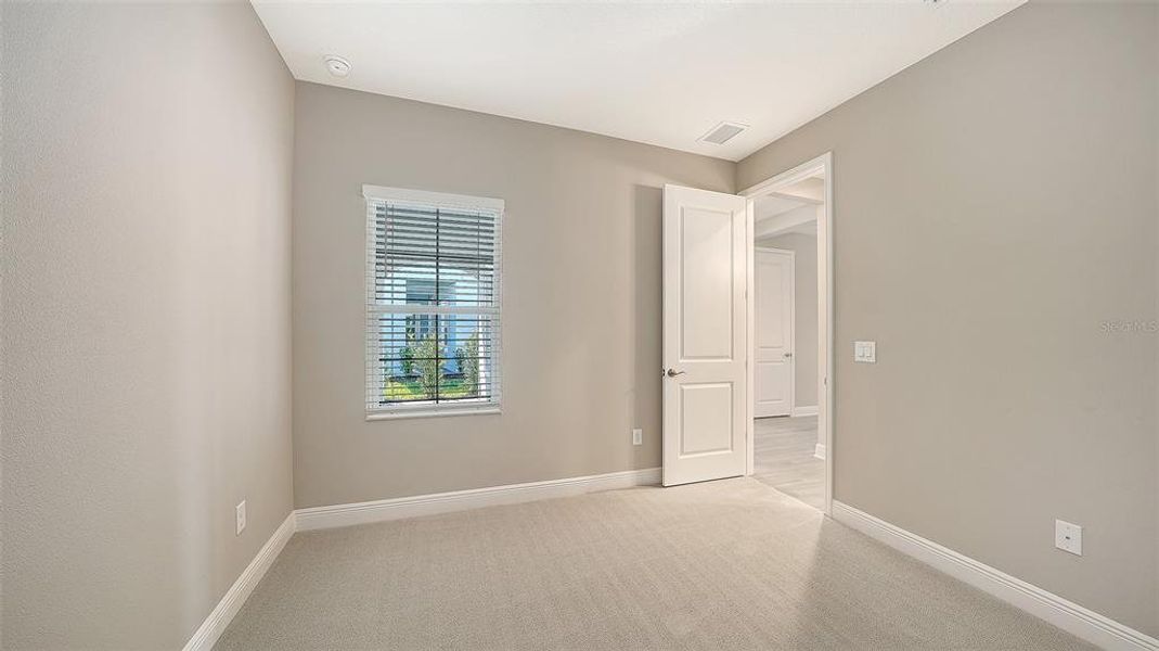 Spacious, unfurnished interior of a new home in Palm Grove, Lakewood Ranch (Image 35).