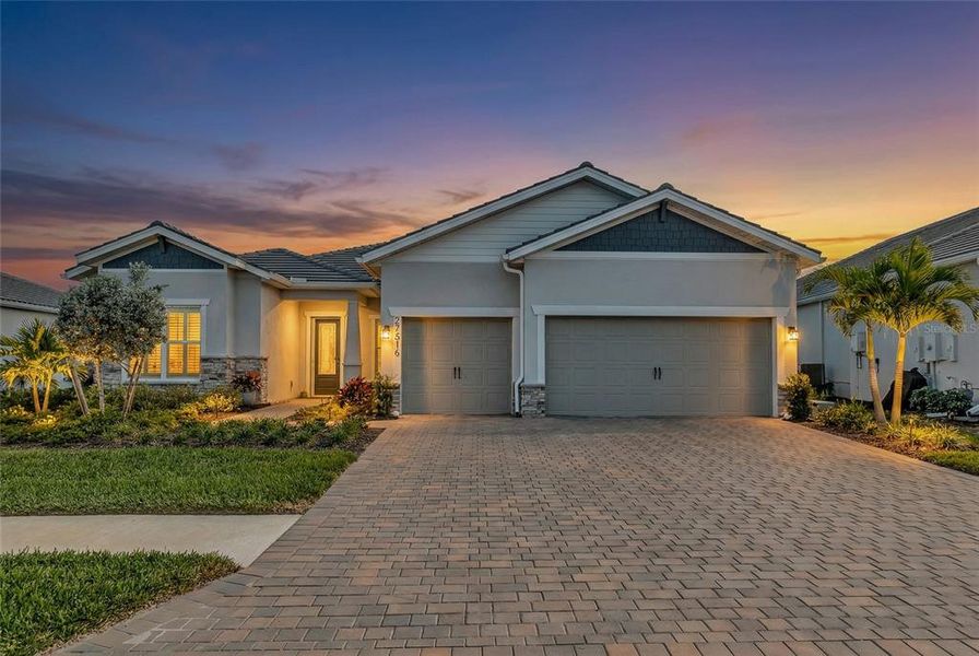 Front exterior of a new home in , Englewood, FL, highlighting curb appeal (Image 2). Front exterior of a new home in , Englewood, FL, highlighting curb appeal (Image 2).