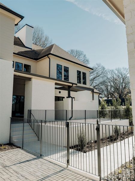 Exterior details and patio area of a home in , Charlotte (Image 29).