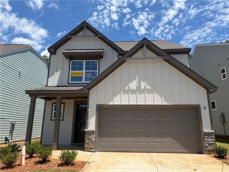 Front exterior of a new home in Villas at Dawsonville, Dawsonville, GA, highlighting curb appeal (Image 1). Front exterior of a new home in Villas at Dawsonville, Dawsonville, GA, highlighting curb appeal (Image 1).