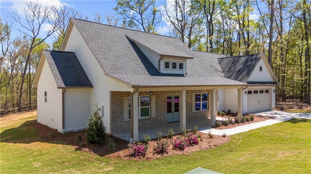 Front exterior of a new home in , Gainesville, GA, highlighting curb appeal (Image 23).