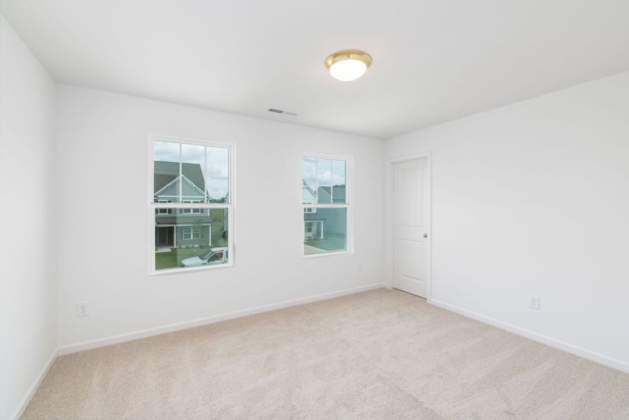 Spacious, unfurnished interior of a new home in Nathans Ridge, Lillington (Image 21).