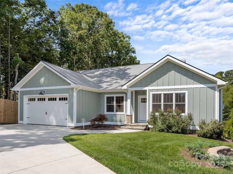 Front exterior of a new home in , Hendersonville, NC, highlighting curb appeal (Image 20).