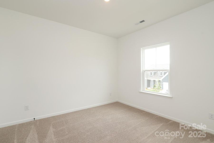 Spacious, unfurnished interior of a new home in Estates at Sugar Creek, Indian Land (Image 34).