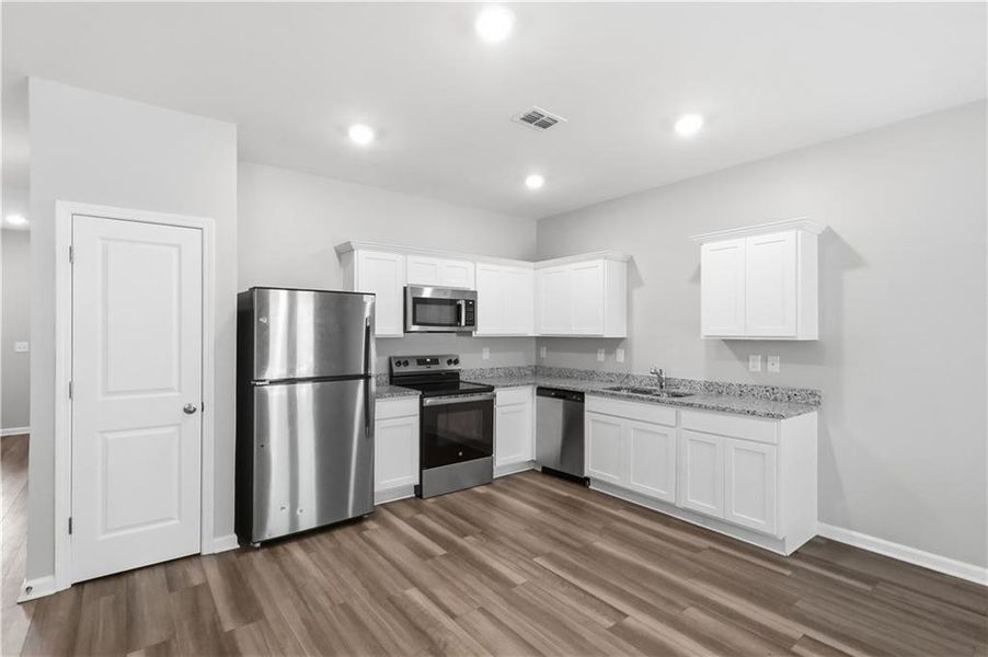 Furnished interior view inside a new home in , Atlanta (Image 4).