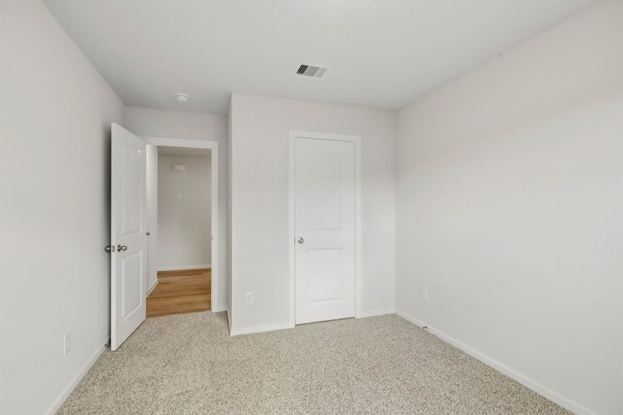 Spacious, unfurnished interior of a new home in New Waverly Station, New Waverly (Image 17). Spacious, unfurnished interior of a new home in New Waverly Station, New Waverly (Image 17).