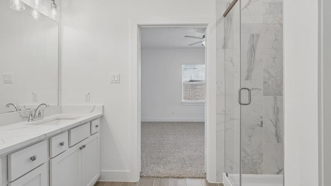 Furnished interior view inside a new home in Meridiana Townhomes, Iowa Colony (Image 11).