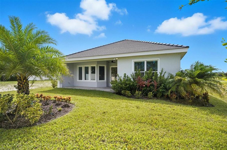 Exterior details and patio area of a home in Marina Del Palma, Palm Coast (Image 2).