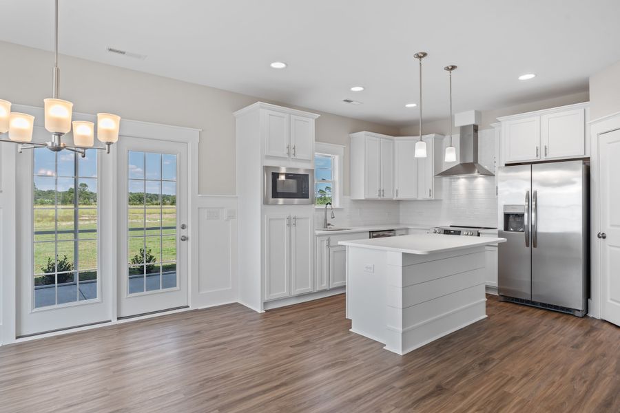 Representative furnished interior of a home built from the Kauai by Bill Clark Homes in The Sanctuary at Sunset Beach, Sunset Beach (Image 5). Representative furnished interior of a home built from the Kauai by Bill Clark Homes in The Sanctuary at Sunset Beach, Sunset Beach (Image 5).