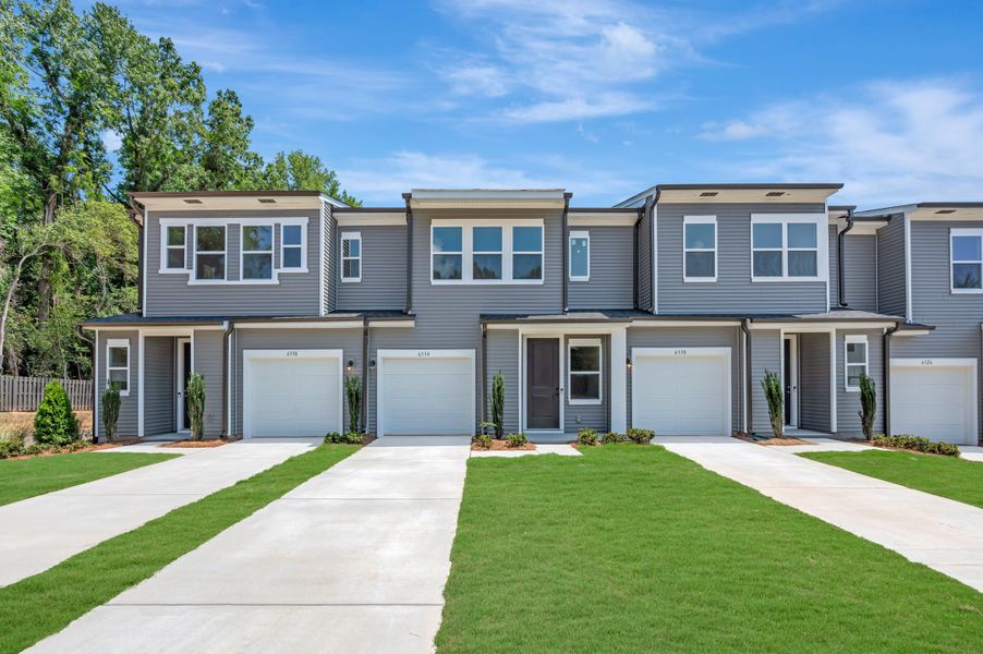 Front exterior of a new home in Amplitude, Charlotte, NC, highlighting curb appeal (Image 2). Front exterior of a new home in Amplitude, Charlotte, NC, highlighting curb appeal (Image 2).