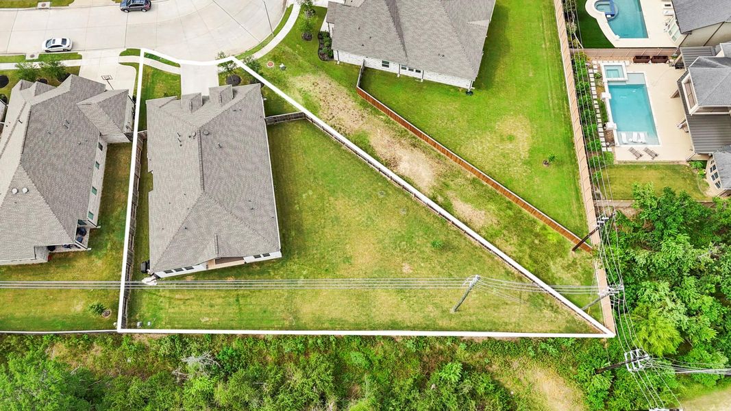 The aerial view showcases the oversized pool sized lot with no back neighbors! This property is the perfect canvas to create your ultimate outdoor retreat! The aerial view showcases the oversized pool sized lot with no back neighbors! This property is the perfect canvas to create your ultimate outdoor retreat!