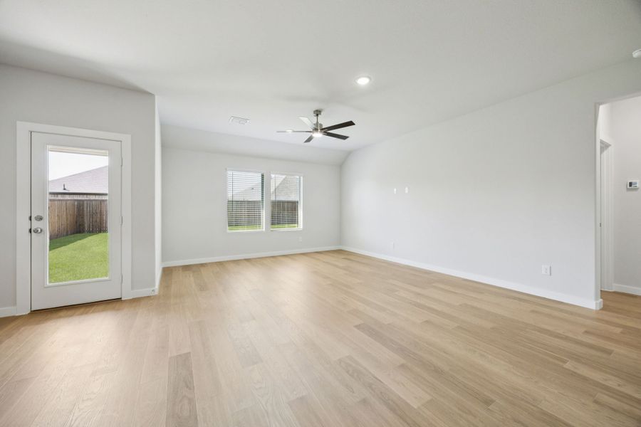 Living Room in the Heisman home plan by Trophy Signature Homes – REPRESENTATIVE PHOTO Living Room in the Heisman home plan by Trophy Signature Homes – REPRESENTATIVE PHOTO