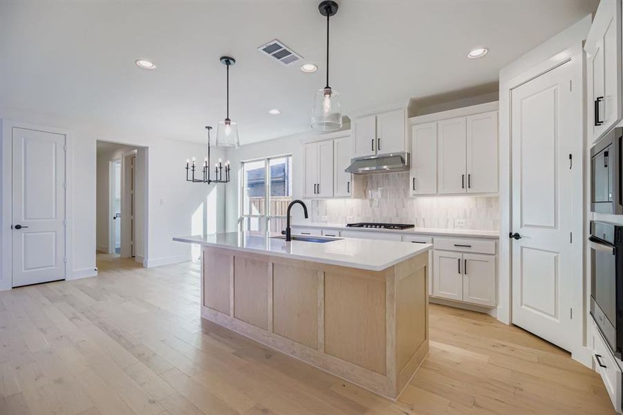 Furnished interior view inside a new home in Mosaic 40s, Celina (Image 10).