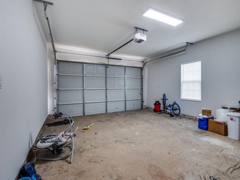 Garage featuring a garage door opener Garage featuring a garage door opener