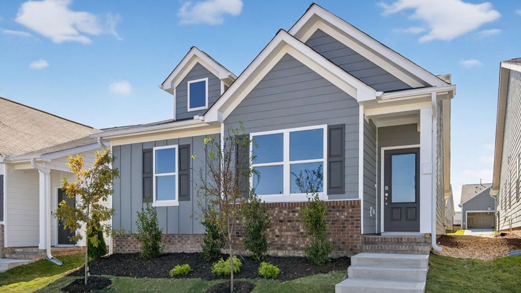 Representative exterior photo of a completed home built from the BECKETT by D.R. Horton in The Villas at Haywood Glen, Knightdale, NC (Image 15).