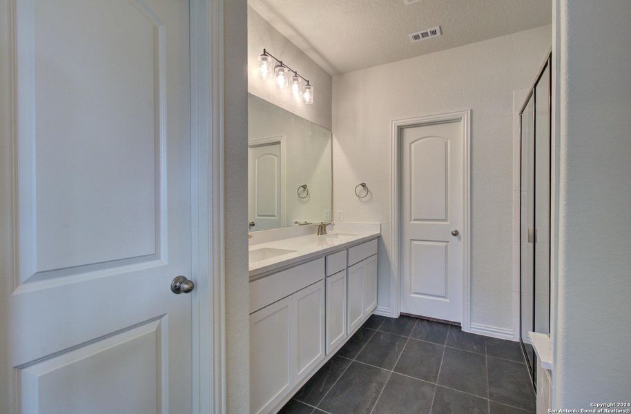 Furnished interior view inside a new home in , New Braunfels (Image 10).