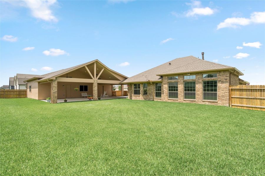 The surrounding lush, level lawn offers ample room for lawn games, a future pool, a boat trailer, or all of the above. The surrounding lush, level lawn offers ample room for lawn games, a future pool, a boat trailer, or all of the above.