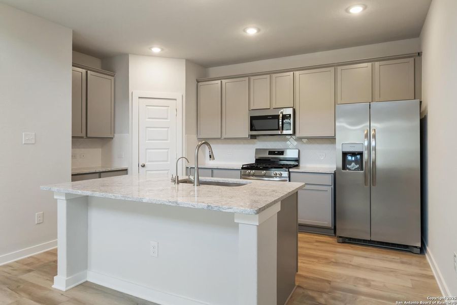 Furnished interior view inside a new home in Timber Creek, San Antonio (Image 5).