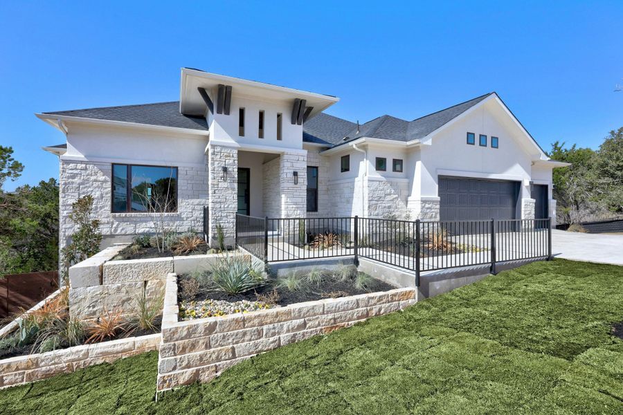 Front exterior of a new home in Riverstone, Georgetown, TX, highlighting curb appeal (Image 20).