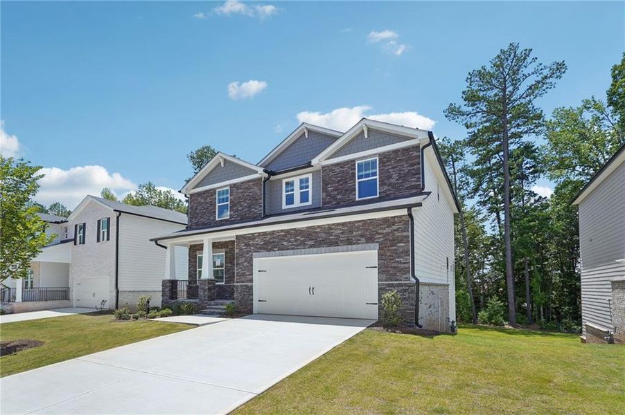Front exterior of a new home in Martin Springs - Estate Series, Lawrenceville, GA, highlighting curb appeal (Image 21).