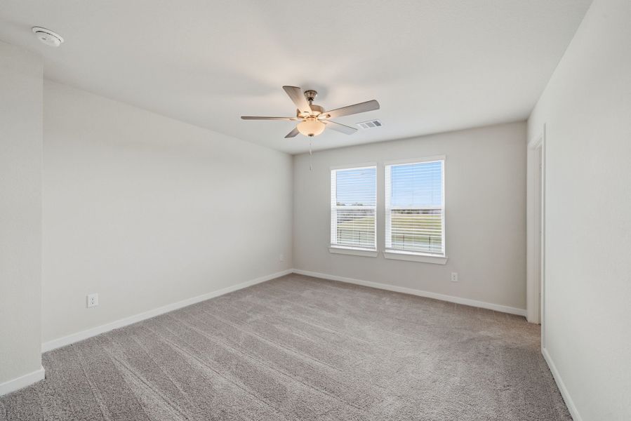 A room with a ceiling fan and a ceiling fan. A room with a ceiling fan and a ceiling fan.