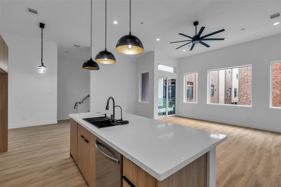 The second floor features an open-concept layout that connects the kitchen, dining area, and living room, creating a spacious and inviting setting for everyday living and entertaining. The second floor features an open-concept layout that connects the kitchen, dining area, and living room, creating a spacious and inviting setting for everyday living and entertaining.