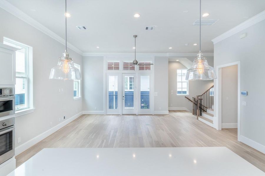 The open palette is yours.  Let the fun begin!  Huge windows all the way around and a balcony too. Similar plan and finishes.