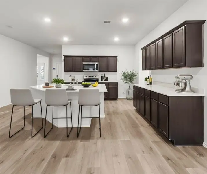 Kitchen view of 2232 Lattimore St, Denton, TX 76209. Virtually Staged.