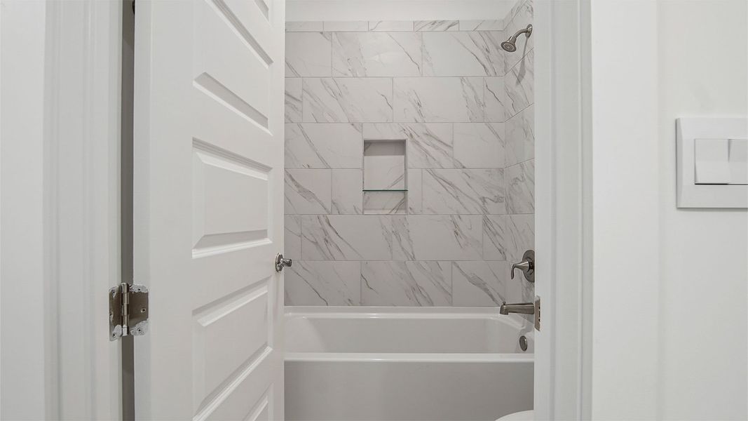 Representative furnished interior of a home built from the Magnolia by D.R. Horton in Breakfast Point East Phase II, Panama City Beach (Image 16).