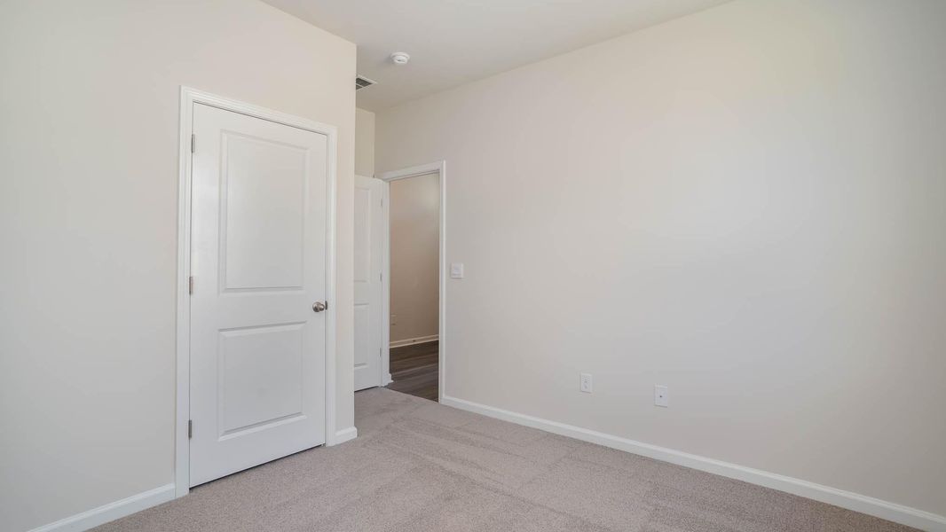 Representative unfurnished interior of a home built from the KERRY by D.R. Horton in Sandridge Park, Little River (Image 13).