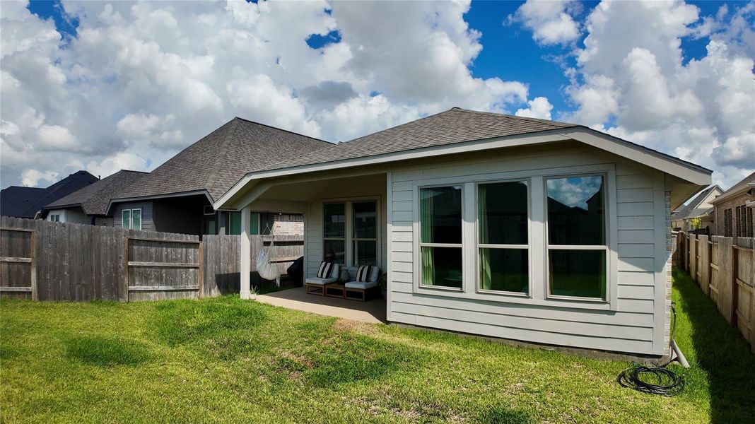 Exterior details and patio area of a home in The Grand Prairie, Hockley (Image 23).