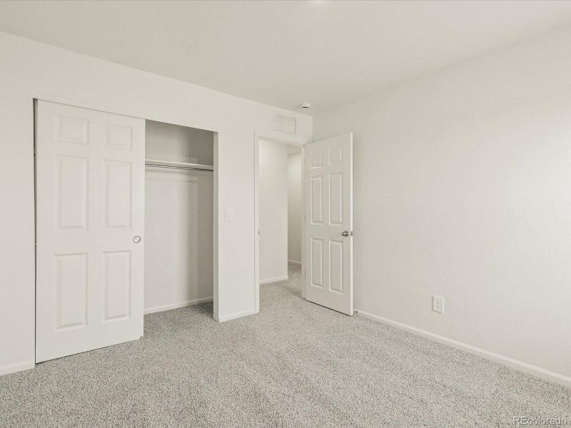 Spacious, unfurnished interior of a new home in Skyview at High Point, Aurora (Image 20).