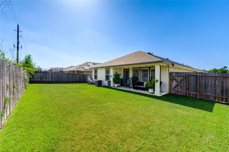 Front exterior of a new home in Palm Royal Estates, Baytown, TX, highlighting curb appeal (Image 2). Front exterior of a new home in Palm Royal Estates, Baytown, TX, highlighting curb appeal (Image 2).