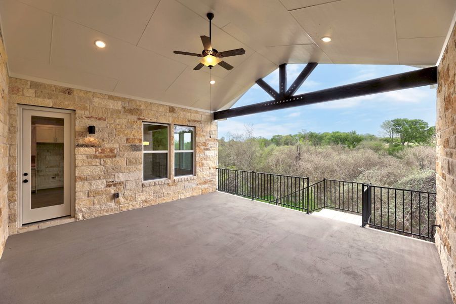 Exterior details and patio area of a home in Double Eagle Ranch, Cedar Creek (Image 4).