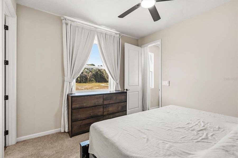 Furnished interior view inside a new home in Seasons at Lakeside Forest, Tavares (Image 28).
