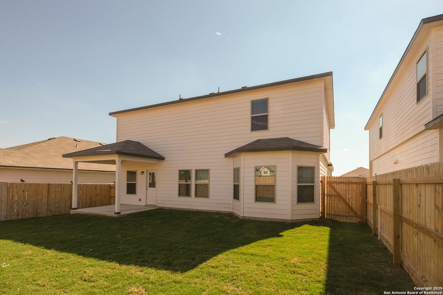 Exterior details and patio area of a home in Paloma Park, Converse (Image 3).