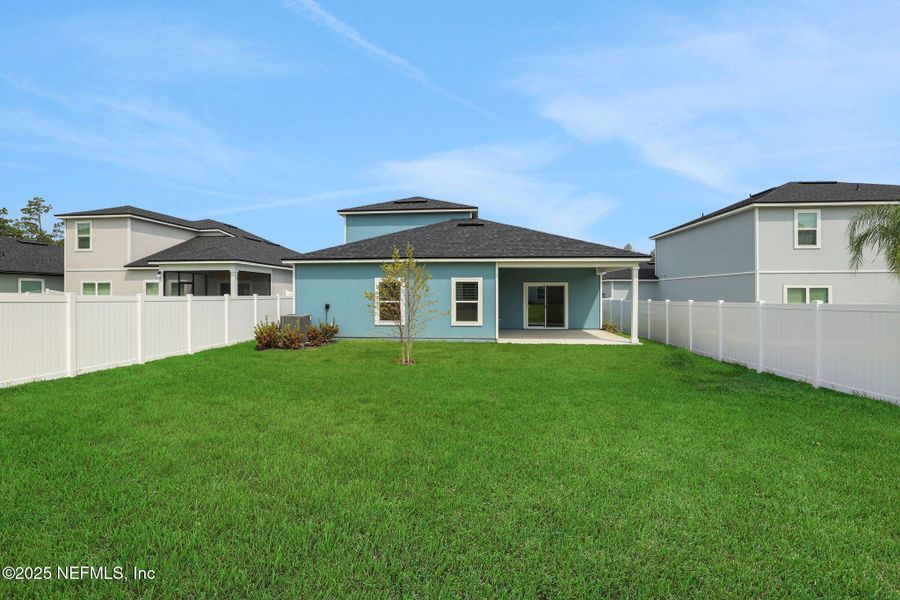 Front exterior of a new home in Cordova Palms, St. Augustine, FL, highlighting curb appeal (Image 19).