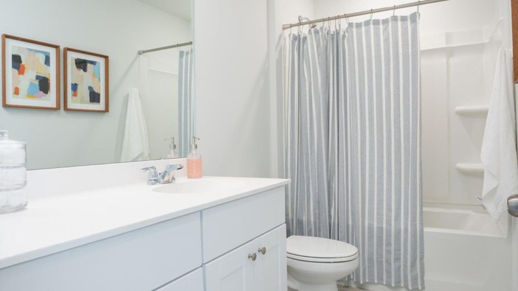 Furnished interior view inside a new home in Lindera Preserve at Cane Bay Plantation: American Dream Series, Summerville (Image 4). Furnished interior view inside a new home in Lindera Preserve at Cane Bay Plantation: American Dream Series, Summerville (Image 4).