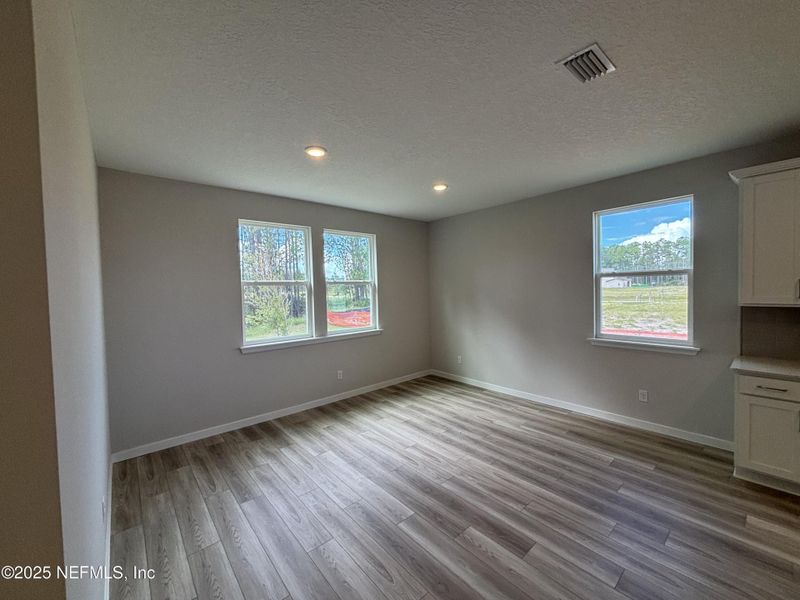 Spacious, unfurnished interior of a new home in The Cypress Series at Reserve East, Flagler Beach (Image 18).