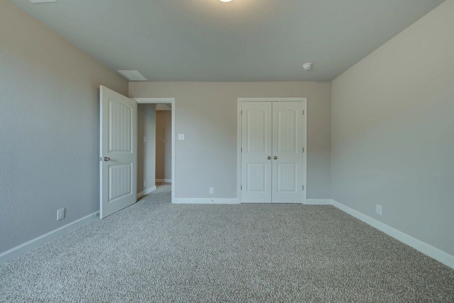 Representative unfurnished interior of a home built from the Cleburne by Ashton Woods in Mustang Oaks, San Antonio (Image 43).
