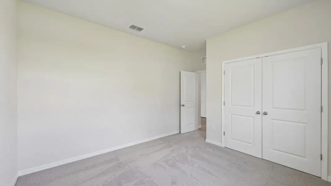 Spacious, unfurnished interior of a new home in Oakfield Trails, Parrish (Image 18).