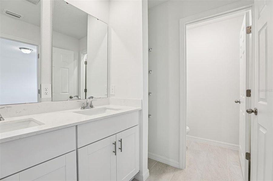 Furnished interior view inside a new home in Cagan Crossings West, Clermont (Image 16).