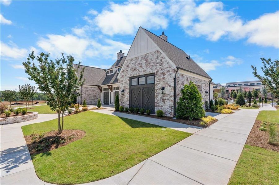 Front exterior of a new home in Waterhaven, Cumming, GA, highlighting curb appeal (Image 23).
