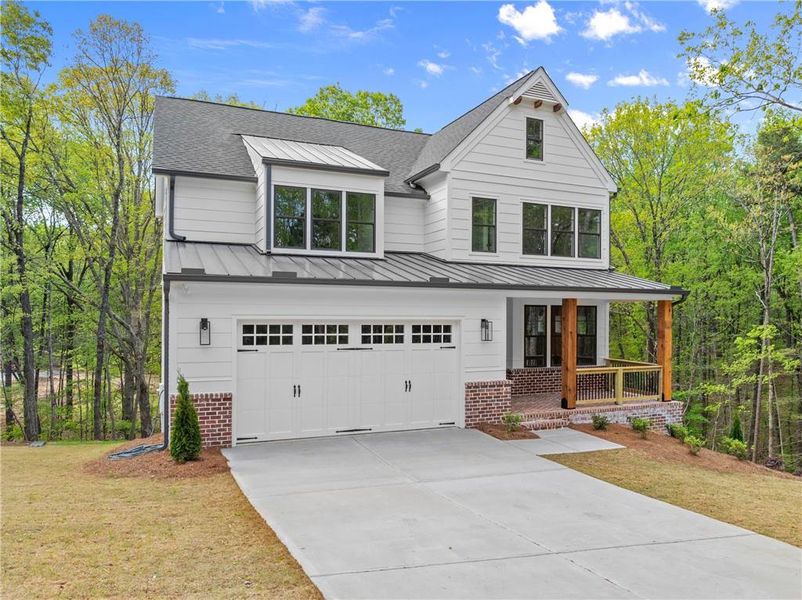 Front exterior of a new home in , Dawsonville, GA, highlighting curb appeal (Image 2). Front exterior of a new home in , Dawsonville, GA, highlighting curb appeal (Image 2).