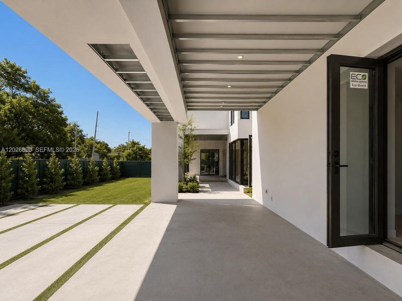 Exterior details and patio area of a home in , Miami (Image 4). Exterior details and patio area of a home in , Miami (Image 4).